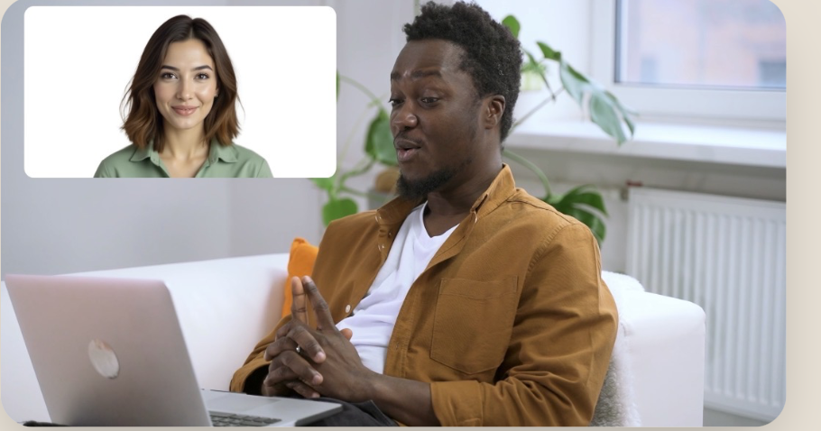 A man on a video consultation with a clinician from his sofa